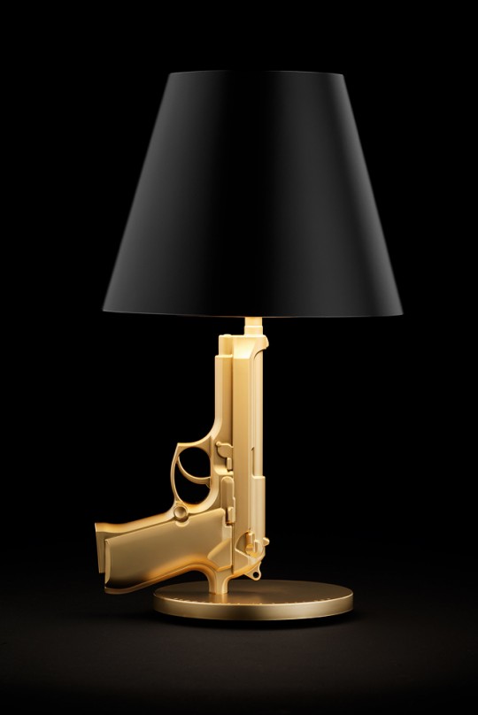 Lampe bedside gun en or by Starck pour Flos