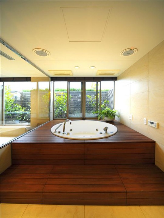 L'appartement avec 1 chambre le plus cher du monde - baignoire ronde encastrée dans le sol