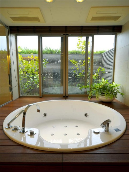 L'appartement avec 1 chambre le plus cher du monde - baignoire ronde jacuzzi encastrée