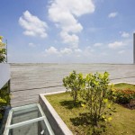 Jardin sur le toit d'une maison écologique Stacking Green